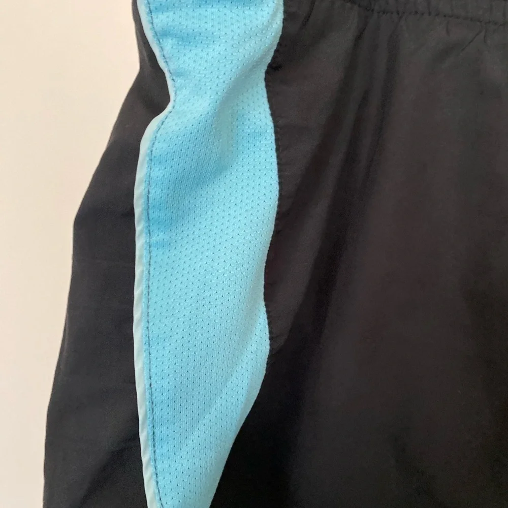 DRI – FIT NIKE blue and black running shorts ladies size XL